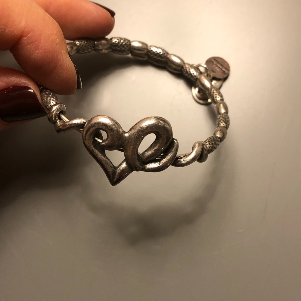 Alex and Ani silver heart wrap adjustable bangle. Looks great worn in a “stack”